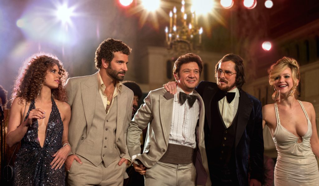 (l to r) Amy Adams, Bradley Cooper, Jeremy Renner, Christian Bale and Jennifer Lawrence in Columbia Pictures' AMERICAN HUSTLE., (l to r) Amy Adams, Bradley Cooper, Jeremy Renner, Christian Bale and Jennifer Lawrence in Columbia Pictures' AMERICAN HUSTLE. (l to r) Amy Adams, Bradley Cooper, Jeremy Renner, Christian Bale and Jennifer Lawrence in (l to r) Amy Adams, Bradley Cooper, Jeremy Renner, Christian Bale and Jennifer Lawrence in (l to r) Amy Adams, Bradley Cooper, Jeremy Renner, Christian Bale and Jennifer Lawrence in 