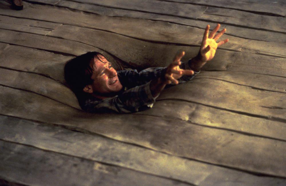 Szenenbild aus JUMANJI (1995) - Alan (Robin Williams) versinkt im Boden - © Sony Home