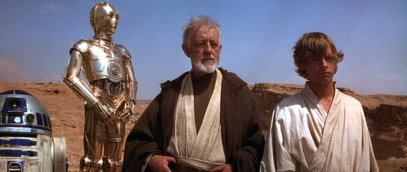 Szenenbild aus STAR WARS: EPISODE IV - A NEW HOPE - Obi-Wan Kenobi (Alec Guiness) tut sich mit Luke Skywalker (Mark Hamill) zusammen um Leia zu retten. - © 20th Century Fox