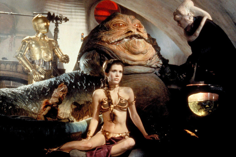 Szenenbild aus STAR WARS: EPISODE 6 - RETURN OF THE JEDI - Jabba the Hutt hat Leia (Carrie Fisher) gefangen genommen. - © 20th Century Fox